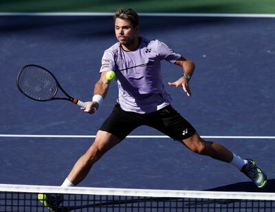 epa07423830 Stan Wawrinka of Switzerland in action against Daniel Evans of Great Britain during the BNP Paribas Open tennis tournament at the Indian Wells Tennis Garden in Indian Wells, California, USA, 08 March 2019. The men's and women's final will be played on 17 March 2019.  EPA/JOHN G. MABANGLO