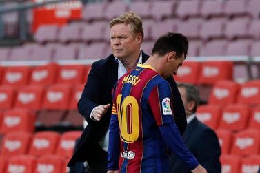 Barcelona's Lionel Messi and coach Ronald Koeman after the Celta Vigo defeat. Reuters