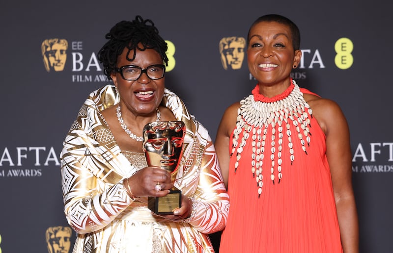 June Givanni with presenter Adjoa Andoh after winning the Bafta award for Outstanding British Contribution to Cinema. EPA