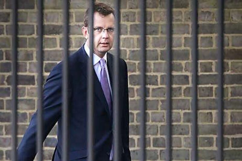 Andy Coulson, the director of communications for David Cameron, resigned his post as editor of the News of the World following allegations of phone hacking, but denied knowing that the practice was being used.