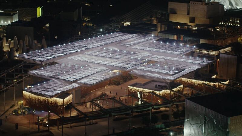 A night view of the Opportunity Pavilion, one of three theme districts, that will draw visitors to connect in a plaza-themed interior.