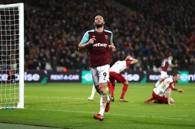 LONDON, ENGLAND - JANUARY 02: Andy Carroll of West Ham United celebrates after scoring his sides first goal during the Premier League match between West Ham United and West Bromwich Albion at London Stadium on January 2, 2018 in London, England.  (Photo by Catherine Ivill/Getty Images)