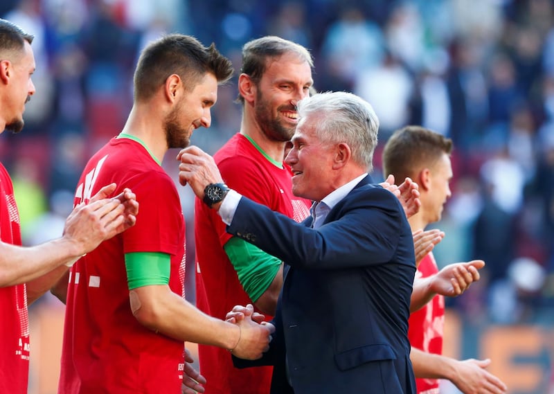 Bayern Munich coach Jupp Heynckes shakes hands with Sven Ulreich as they celebrate winning the league on April 7, 2018.  Michaela Rehle / Reuters