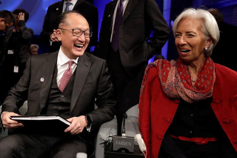 World Bank President Jim Yong Kim and International Monetary Fund (IMF) Managing Director Christine Lagarde laugh at Development Committee meeting during the IMF/World Bank spring meeting in Washington, U.S., April 21, 2018. REUTERS/Yuri Gripas
