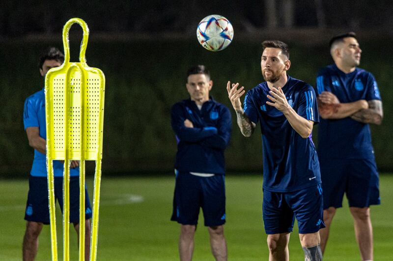 Lionel Messi takes part in an Argentina training session in Doha. EPA