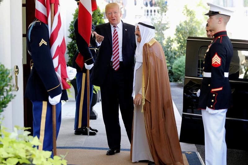 U.S. President Donald Trump (center L) welcomes Kuwait's Emir Sabah Al-Ahmad Al-Jaber Al-Sabah (center R) at the White House in Washington, U.S. September 7, 2017. REUTERS/Jonathan Ernst