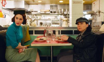 This image released by Amazon shows Rachel Brosnahan, left, and Alex Borstein in a scene from "The Marvelous Mrs. Maisel."   On Tuesday, July 16, 2019, Borstein was nominated for an Emmy Award for outstanding supporting actress in a comedy series. (Amazon via AP)