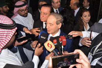 Syria's Foreign Minister Faisal Mekdad (C) speaks to reporters after attending the Arab Foreign Ministers Preparatory Meeting ahead of the 32nd Arab League Summit in Jeddah on May 17, 2023. AFP