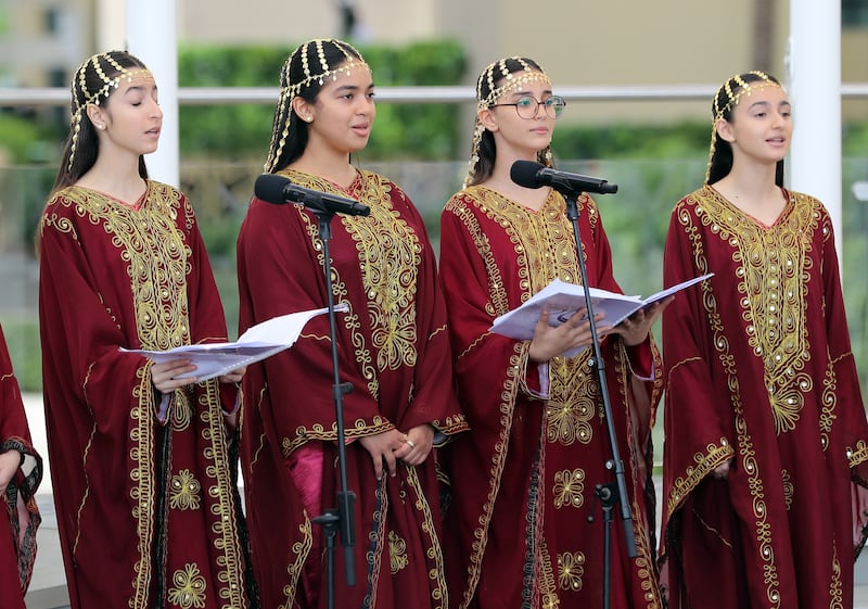 Young people perform during Qatar Day at Expo 2020 Dubai