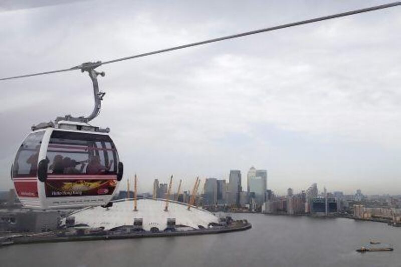An Emirates Air Line cable car carries passengers across the River Thames. Simon Dawson / Bloomberg