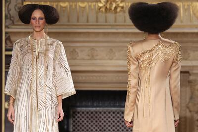 Tailored coats and languid kaftans with golden embroidery at the Maison Sara Chraibi show in Paris. AFP
