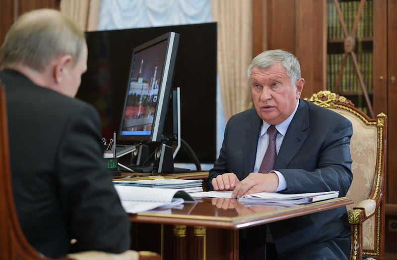 Russian President Vladimir Putin meets with Russia's oil giant Rosneft chief Igor Sechin. He has been described as Mr Putin's right-hand man. AFP