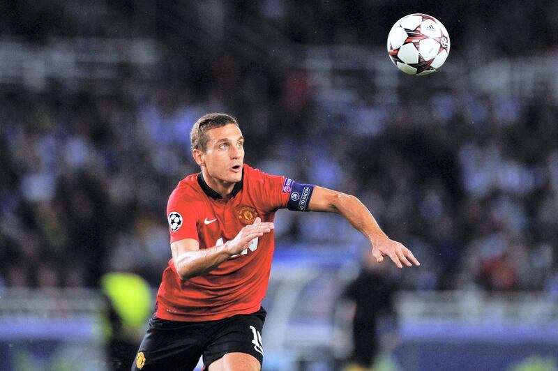 SAN SEBASTIAN, SPAIN - NOVEMBER 05:  Nemanja Vidic of Manchester United clears the ball during the UEFA Champions League Group A match between Real Sociedad de Futbol and Manchester United at Estadio Anoeta on November 5, 2013 in San Sebastian, Spain.  (Photo by David Ramos/Getty Images)