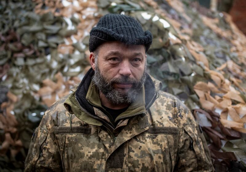 A Ukrainian soldier poses for a picture in the Donetsk enclave. Reuters
