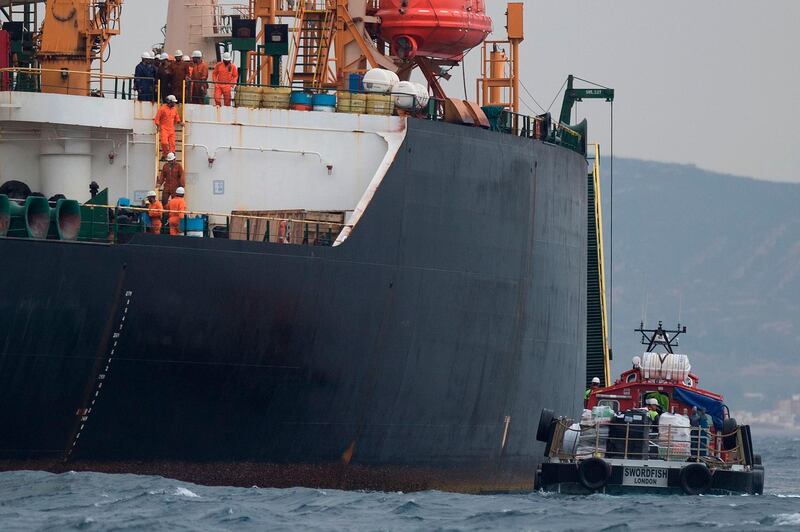 A ship approaches supertanker Grace 1 off the coast of Gibraltar.  AFP