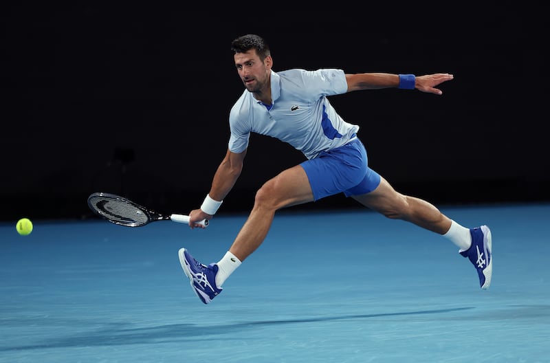 Novak Djokovic chases the ball during his match against Adrian Mannarino. Getty Images