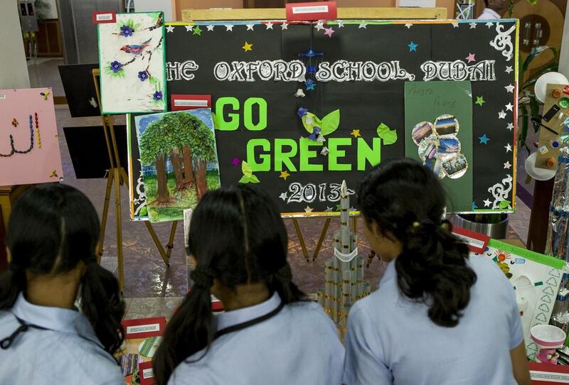 Esha Franson, Swetha Sivakumar and Neelanjana Suresh, at JSS Private School, at last year’s recycling exhibition. Antonie Robertson / The National