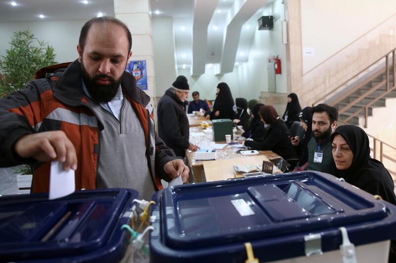A man casts his vote during parliamentary elections at a polling station in Tehran, Iran. Reuters