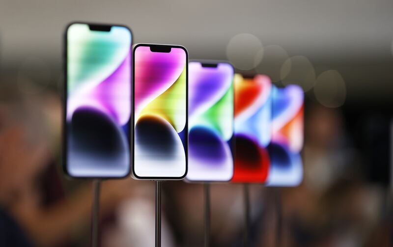 The iPhone 14 Plus screen matches the iPhone 14 Pro Max's, but retains the notch and does not have always-on display. EPA