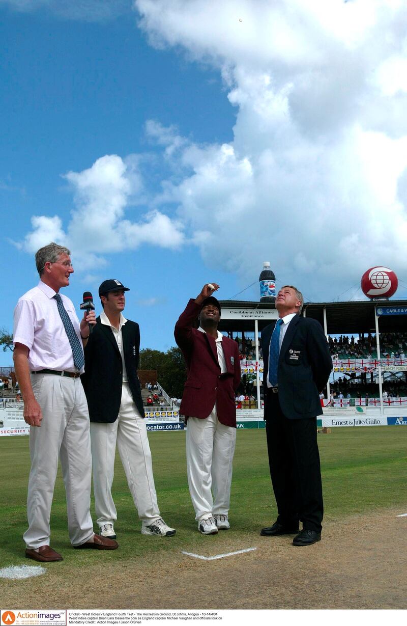 West Indies captain Brian Lara tosses the coin as England captain Michael Vaughan, Bob Willis and an officials look on in Antigua in 2004. Action Images