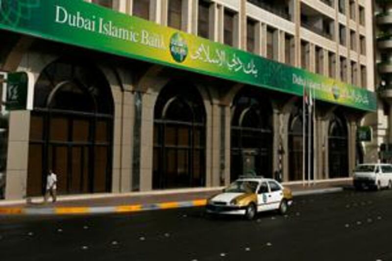 ABU DHABI, UNITED ARAB EMIRATES - October 21, 2008: Pedestrian traffic in front of Dubai Islamic Bank on Airport Road in Abu Dhabi.

( Ryan Carter / The National )