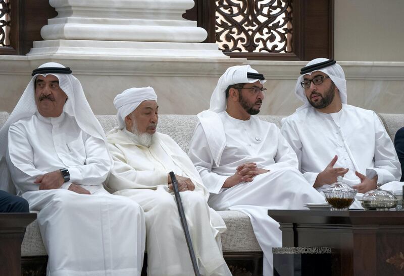 ABU DHABI, UNITED ARAB EMIRATES - May 22, 2019: HH Sheikh Saud bin Rashid Al Mu'alla, UAE Supreme Council Member and Ruler of Umm Al Quwain (L), HE Shaykh Abdallah bin Bayyah (2nd L), HH Sheikh Hamdan bin Zayed Al Nahyan, Ruler’s Representative in Al Dhafra Region (2nd R) and HH Sheikh Rashid bin Saud bin Rashid Al Mu'alla, Crown Prince of Umm Al Quwain (R), attend an iftar reception at Al Bateen Palace.

( Rashed Al Mansoori / Ministry of Presidential Affairs )
---