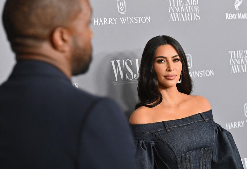 (FILES) In this file photo taken on November 06, 2019, US media personality Kim Kardashian West (R) and husband US rapper Kanye West attend the WSJ Magazine 2019 Innovator Awards in New York City.  Reality television star, influencer and business owner Kim Kardashian West is officially a billionaire, according to an estimate from Forbes, making her debut on the exclusive global list only one year after her younger sister Kylie Jenner fell off of it.  Kardashian West's money comes from TV income and endorsement deals, according to the magazine, as well as her two lifestyle brands.  / AFP / Angela Weiss

