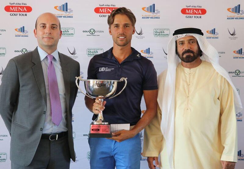 Winner Craig Hinton with Giuliano Gasparini of Aldar Properties and Mohammed Juma Buamaim, chairman of the Mena Golf Tour. Courtesy Mena Golf Tour