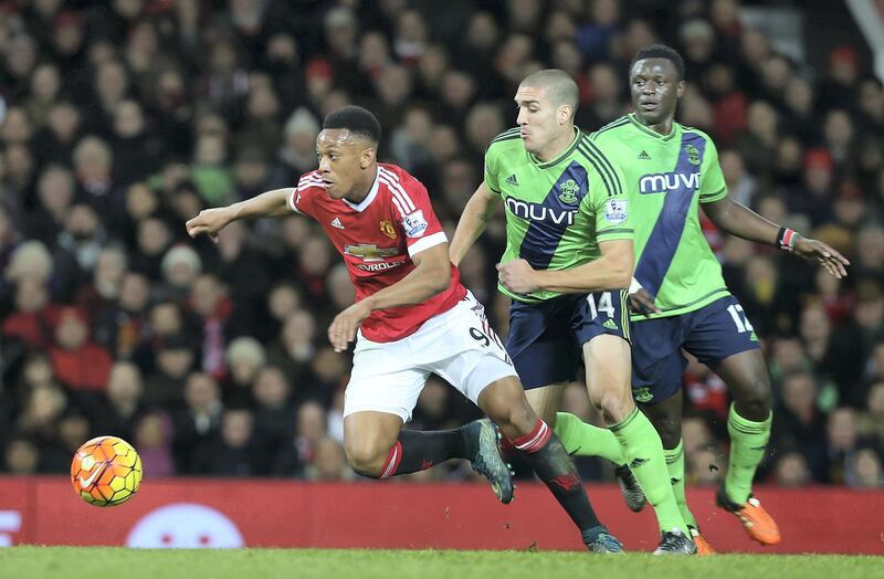 MANCHESTER, ENGLAND - JANUARY 23:  Anthony Martial of Manchester United in action with Oriol Romeu of Southampton during the Barclays Premier League match between Manchester United and Southampton at Old Trafford on January 23, 2016 in Manchester, England.  (Photo by Matthew Peters/Manchester United via Getty Images)