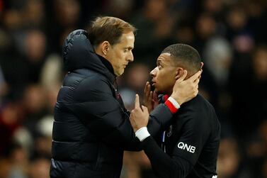 Soccer Football - Ligue 1 - Paris St Germain v Montpellier - Parc des Princes, Paris, France - February 1, 2020 Paris St Germain's Kylian Mbappe speaks to coach Thomas Tuchel as he comes off as a substitute REUTERS/Gonzalo Fuentes