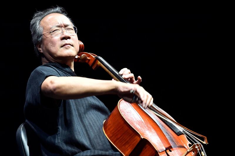 epa07791810 Chinese-American cellist Yo-Yo Ma performs during the last night of the annual Byblos International Festival (BIF), in the ancient city of Byblos (Jbeil), north of Beirut, Lebanon, 24 August 2019.  EPA/WAEL HAMZEH