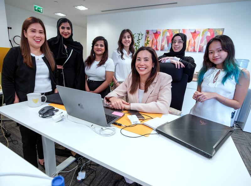 The all-women team of Place Communications, a PR agency in Abu Dhabi. Radwa Allabban (C) is the owner of the business. Victor Besa / The National