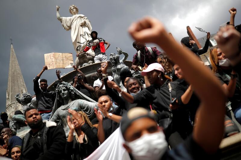 People attend a protest against police brutality and the death in Minneapolis police custody of George Floyd, in Nantes, France. REUTERS