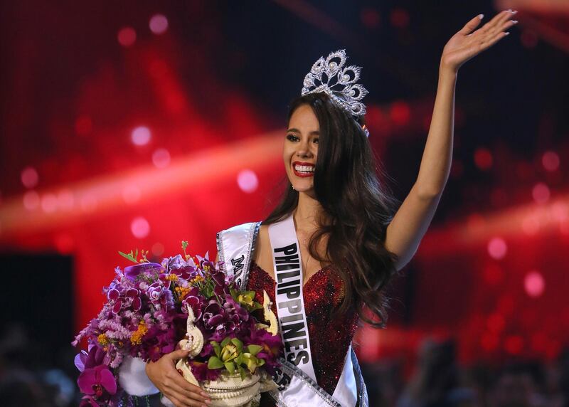 Catriona Gray of the Philippines waves to the audience after being crowned the new Miss Universe 2018 during the final round of the 67th Miss Universe competition in Bangkok, Thailand, Monday, Dec. 17, 2018.(AP Photo/Gemunu Amarasinghe)