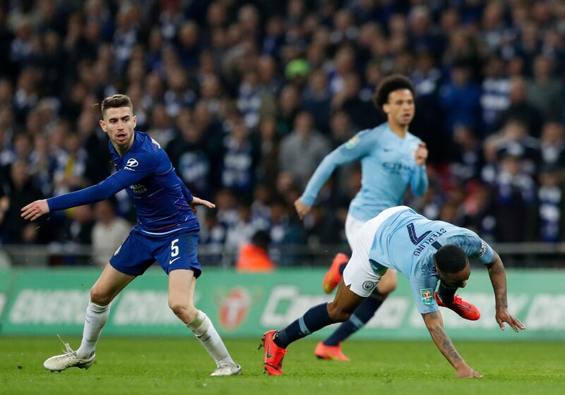 Chelsea's Jorginho, left, fouls Manchester City's Raheem Sterling. AP Photo