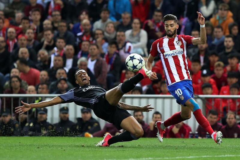 Real Madrid defender Danilo, left, vies with Atletico Madrid’s Yannick Ferreira Carrasco. Cesar Manso / AFP