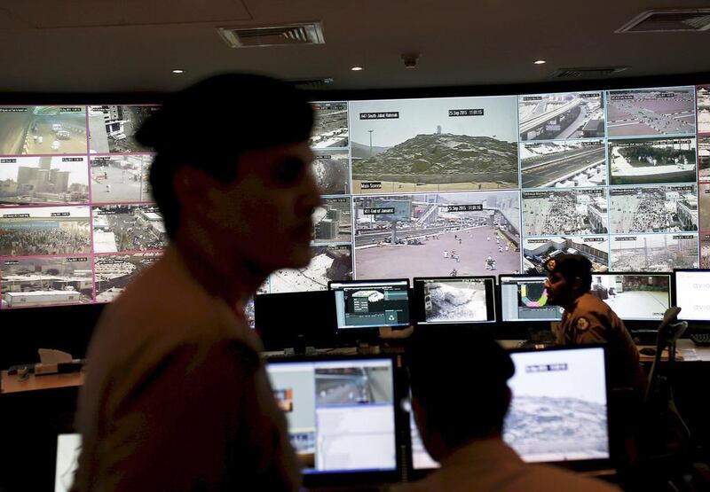 Saudi policemen watch monitor screens showing footage from cameras set up around the holy places in Mina, near the city of Mecca, on September 25, 2015, a day after at least 719 people were killed during a stampede in the area. Ahmad Masood/Reuters