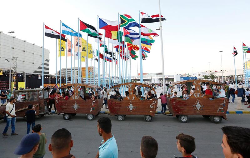 Syrians visit the pavilions at the Damascus International Fair in Damascus.  EPA