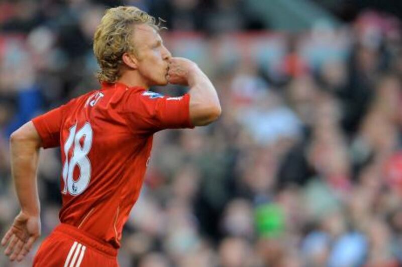 Liverpool's Dutch striker Dirk Kuyt celebrates scoring their winning goal during the English FA Cup fourth round football match between Liverpool and Manchester United at Anfield in Liverpool, north-west England on January 28, 2012. AFP PHOTO/ANDREW YATES

RESTRICTED TO EDITORIAL USE. No use with unauthorized audio, video, data, fixture lists, club/league logos or “live” services. Online in-match use limited to 45 images, no video emulation. No use in betting, games or single club/league/player publications.
 *** Local Caption ***  747509-01-08.jpg