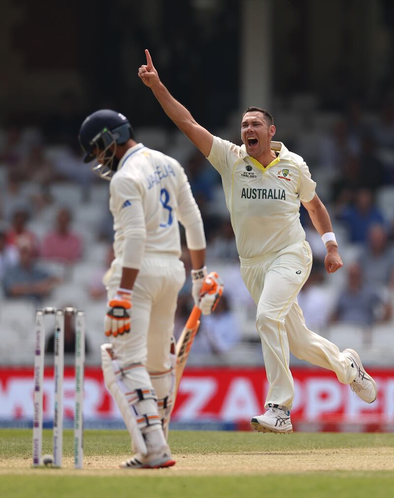 Australia bowler Scott Bolland celebrates after taking the wicket of India's Ravindra Jadeja for a duck. Getty
