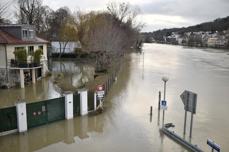 A house surrounded by floodwater from the Seine river in Bougival, west of Paris. Stephane De Sakutin / AFP