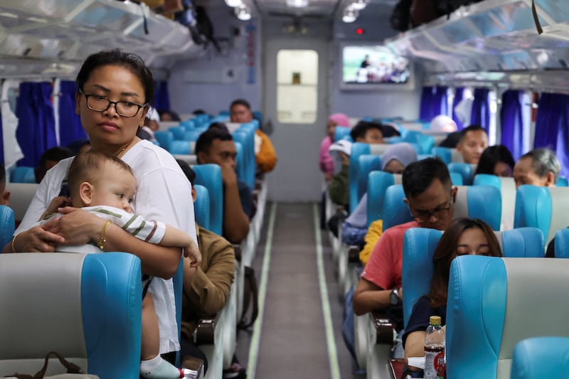 A train filled with people returning home for the Eid holiday in Jakarta. Reuters