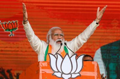 FILE - In this March 7, 2021, file photo, Indian Prime Minister Narendra Modi addresses a public rally ahead of West Bengal state elections in Kolkata, India. Indiaâ€™s death toll from COVID-19 has surpassed 200,000 as a virus surge sweeps the country, rooted in so-called super-spreader events that were allowed to happen in the months following the autumn when  the country had seemingly brought the pandemic under control. (AP Photo/Bikas Das, File)