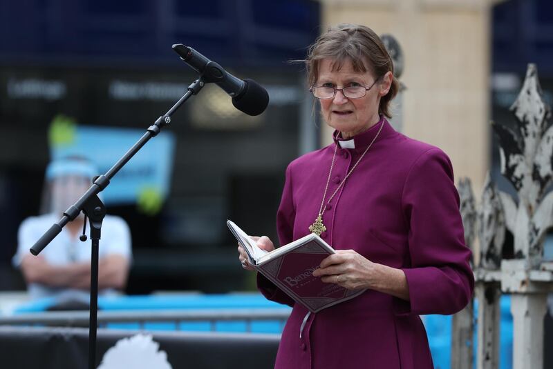 Bishop of Reading, the Right Reverend Olivia Graham, gives a reading during a vigil for the victims of the Reading terror attack, at Market Place on June 27, 2020 in Reading, United Kingdom. Getty Images