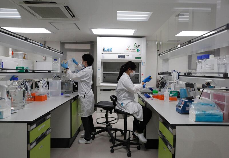 epa08457944 Thai medical technologists work inside a laboratory of the vaccine production process at the Siam Bioscience vaccine production plant, in Nonthaburi province, on the outskirts of Bangkok, Thailand, 01 June 2020. Siam Bioscience vaccine production plant is one of the factories that prepare vaccines for COVID-19 coronavirus. At this time a team of Thai medical researchers have made progress in developing the vaccine against COVID-19 coronavirus after the vaccine prototype being tested on mice proved effective, according to the Thai Public Health Ministry.  EPA/NARONG SANGNAK