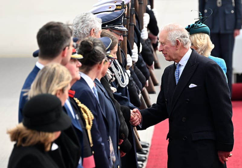 King Charles is greeted at the airport in Berlin. EPA