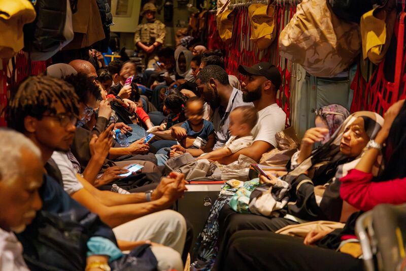 British citizens in an RAF aircraft after being evacuated from Khartoum, Sudan. Reuters