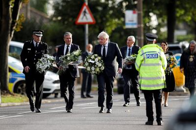 Prime Minister Boris Johnson, Labour leader Sir Keir Starmer and Chief Constable of Essex Police BJ Harrington, arrive at the scene of the stabbing to pay tribute to Sir David Amess. Reuters