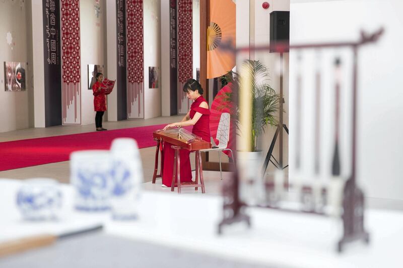 ABU DHABI, UNITED ARAB EMIRATES - JULY 18, 2018. 

A female plays the gzheng as part of UAE-China Week events at Manarat Al Saadiyat in Abu Dhabi, photos show UAE-China strong relationship over the past years.

 A pavilion to celebrate the UAE and Chinese culture was set up at the venue and will be the centerpiece of the UAE-China Week that runs until July 24.

(Photo by Reem Mohammed/The National)

Reporter: 
Section: NA