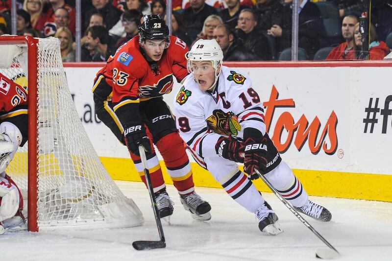 Jonathan Toews, right, leads the Chicago Blackhawks with 16 goals and 30 points. Derek Leung / AFP